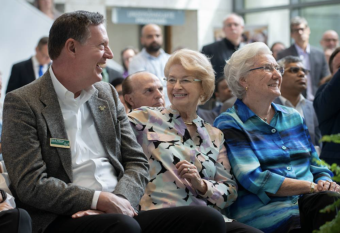 Gary Patterson sits with philanthropists Ellen Cotton and Kate Tiedemann at the couple&#39;s $14 million fintech gift announcement. (Courtesy photo)