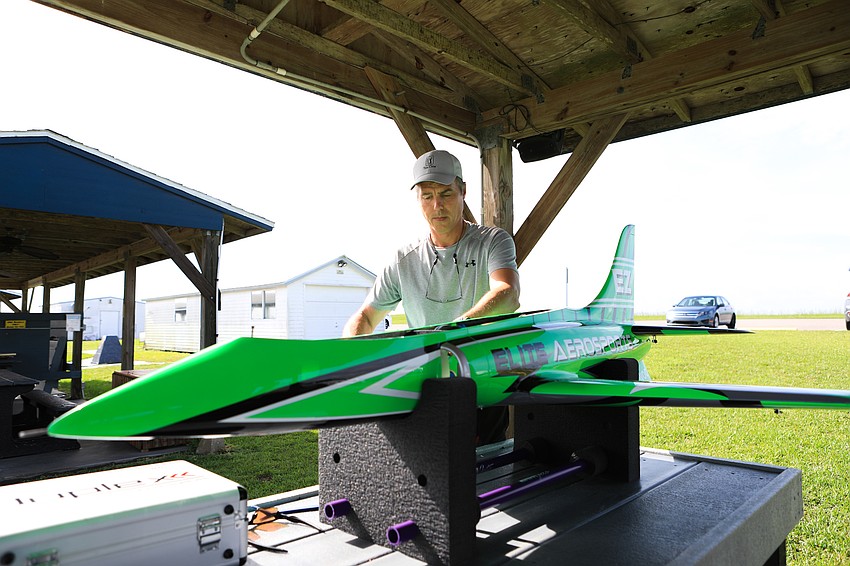 Chad Wrightson prepares his jet plane for flight.