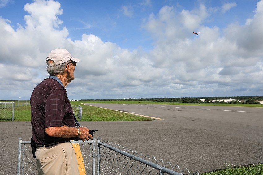 Al Jensen maneuvers his plane throughout the field.
