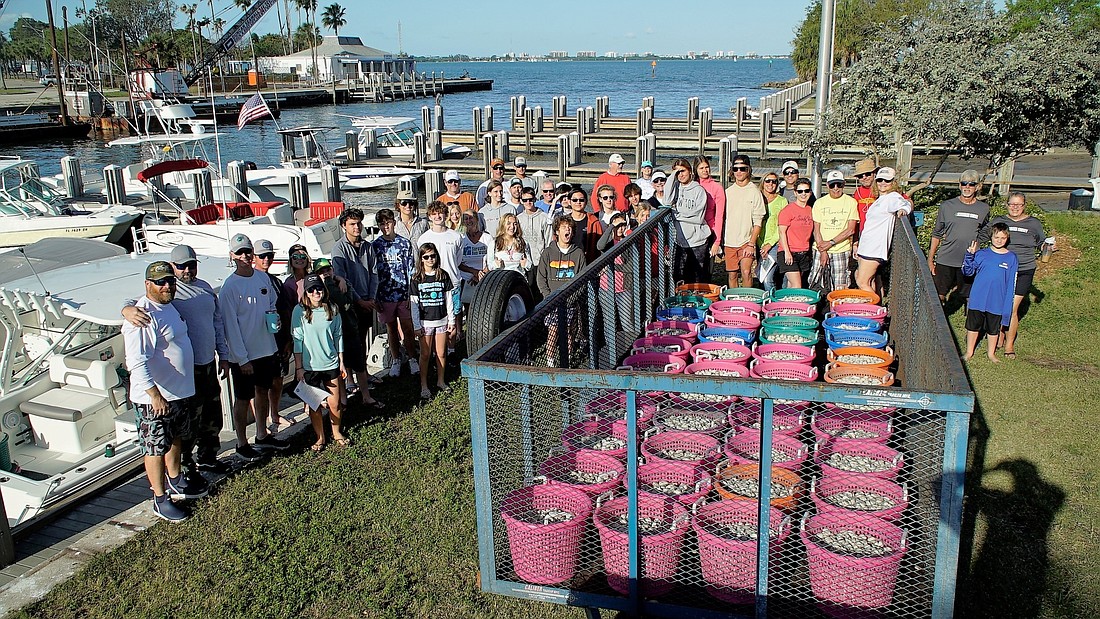 Sarasota Bay Watch volunteers at a clam release in March. (Courtesy photo)
