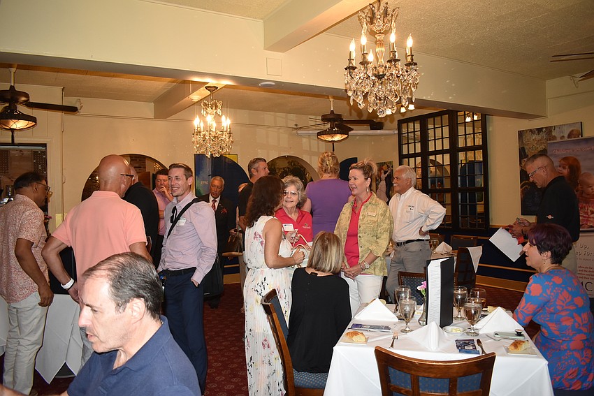 Twenty-five Chamber members dined and socialized at Cafe L'Europe for Networking at Noon.