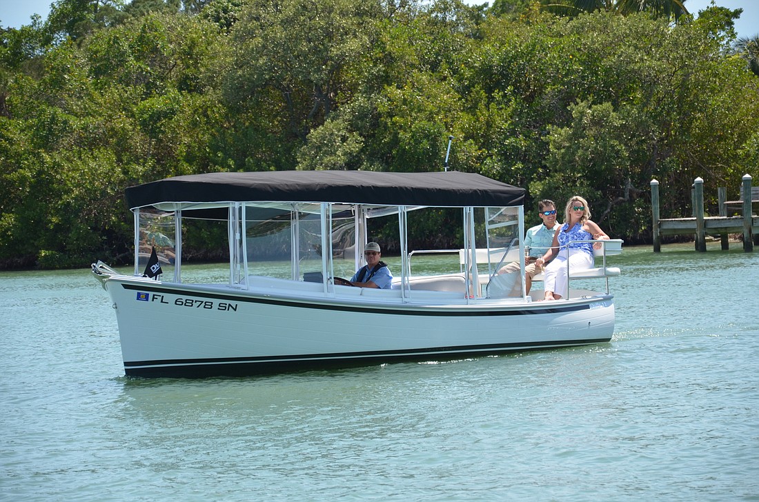 Captain Ed Kolodzieski and two clients enjoy a sunny day on Sarasota Bay in a Duffy Sun Cruiser. (Courtesy photo)