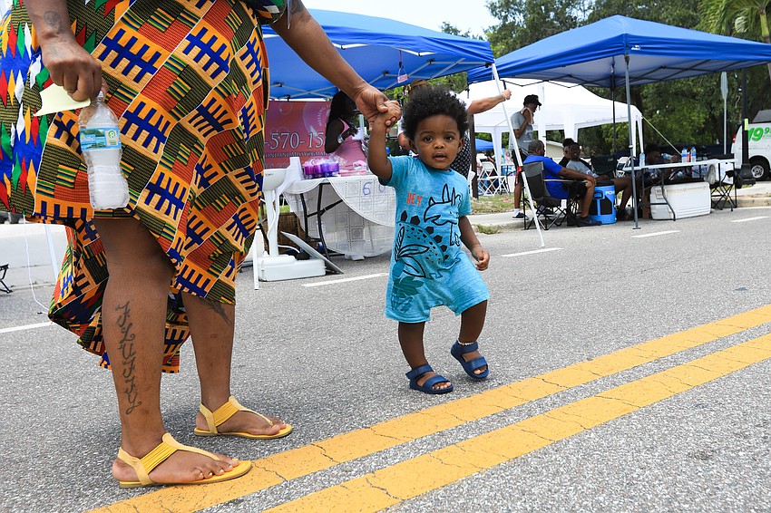 Ire Ade couldn't help but run around the market.