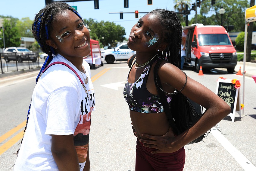 Kayla Clayton and Tamia Austin show off their face paint.
