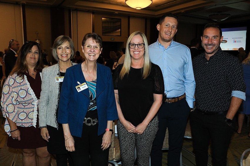 Melissa Carman, Pavitra Ciavardone, Margie Center, Angela Gerholdt, Brady O'Neil and Adrian Gessen with Workplace Development and Innovation award winner Goodwill Industries Manasota