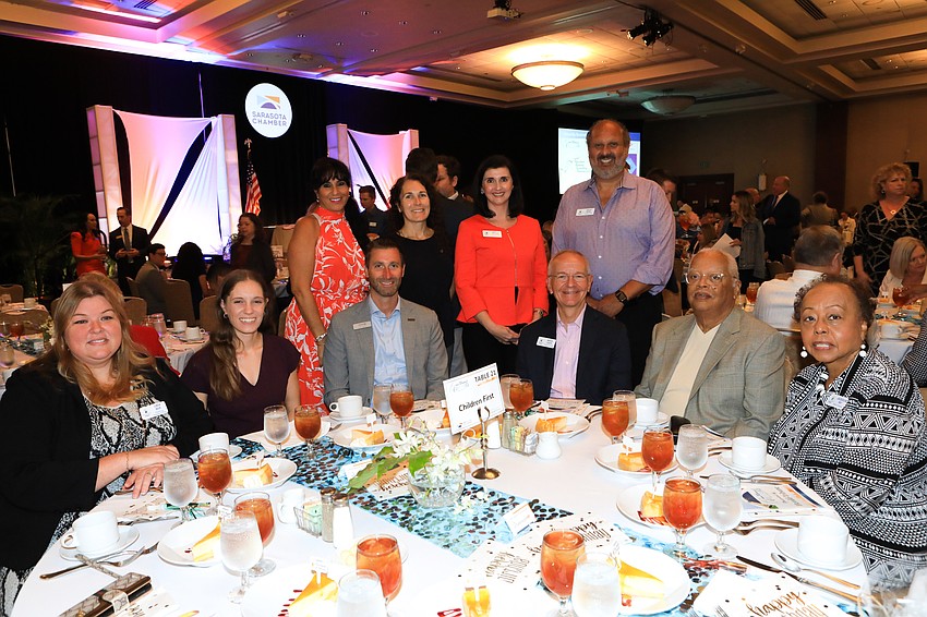 The Children First group celebrated president and CEO Phil Tavil's birthday and winning the Non-Profit award