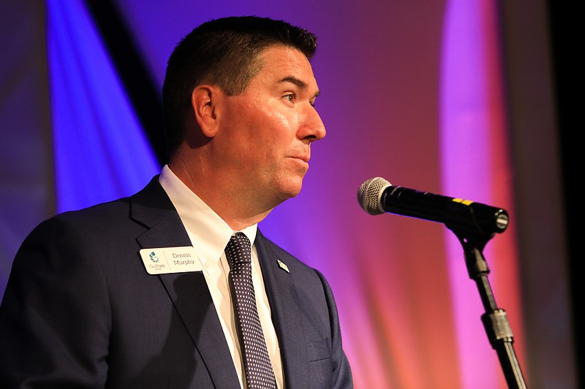 Gulfside Bank president and CEO Dennis Murphy welcomes the audience.