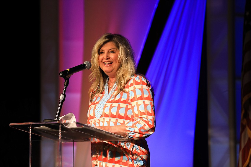 Chamber president and CEO Heather Kasten pays tribute to the 27 videos at the beginning of the ceremony.