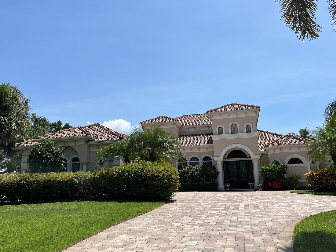  This Country Club home at 6803 Dominion Lane sold for $1,762,000. It has four bedrooms, five-and-a-half baths, a pool and 4,268 square feet of living area.