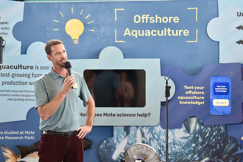 Evan Barnskisis updates chamber members on Mote's expansion into Lakewood Ranch.