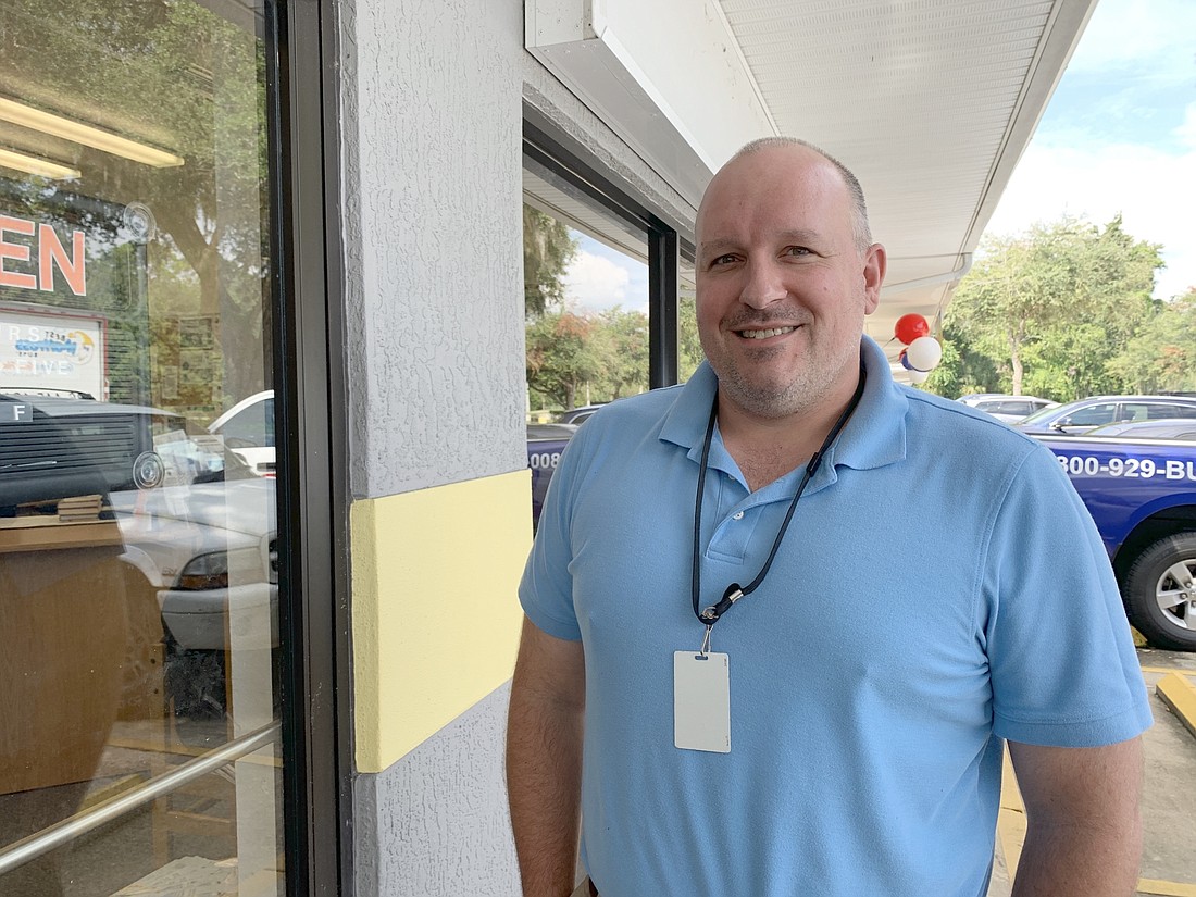 'I feel like this is where God put me," said Jonathan Nemergut, Bunnell branch librarian. Photo by Brian McMillan