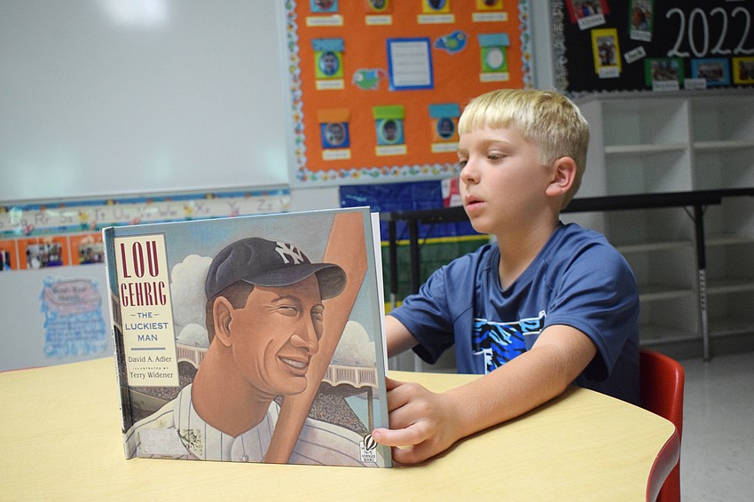 Ryker Kelley quietly reads 