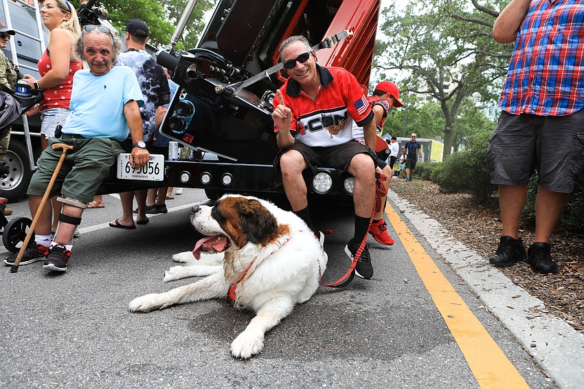 Brett and Charlie Schulman take a minute to sit.
