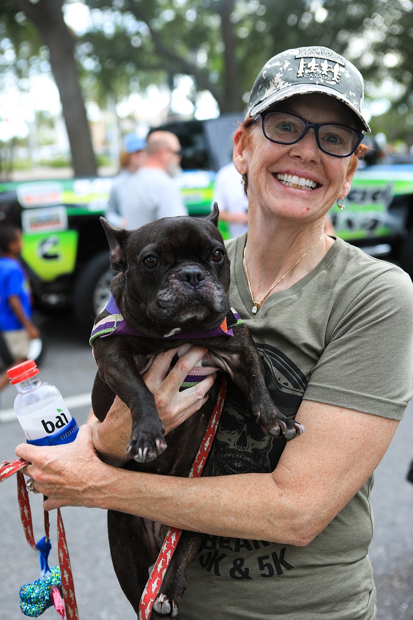 Beth Roth brings her dog, Roux.