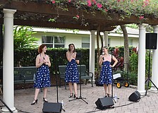The Swing Sisters perform in the garden of St. Armands Key Lutheran Church.