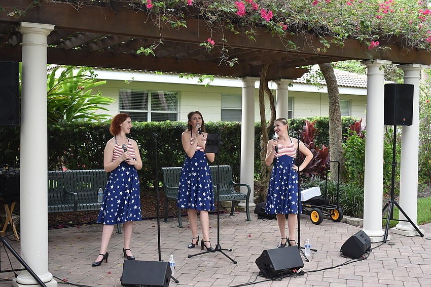 The Swing Sisters perform in the garden of St. Armands Key Lutheran Church.