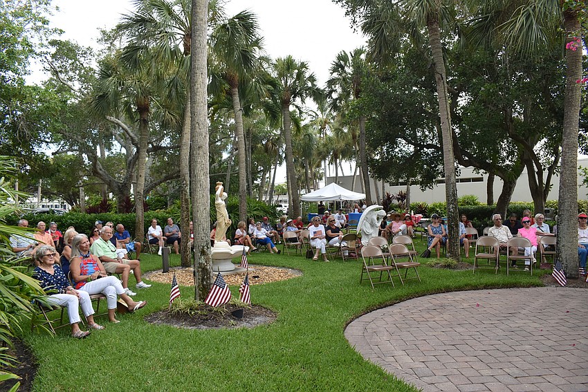 About 60 people gather on the lawn for the first concert of the summer at SAKLC.