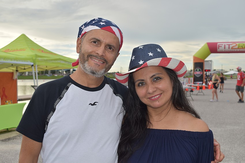 Sarasota's Pedro and Angela Orjuela wore hats for the occasion.
