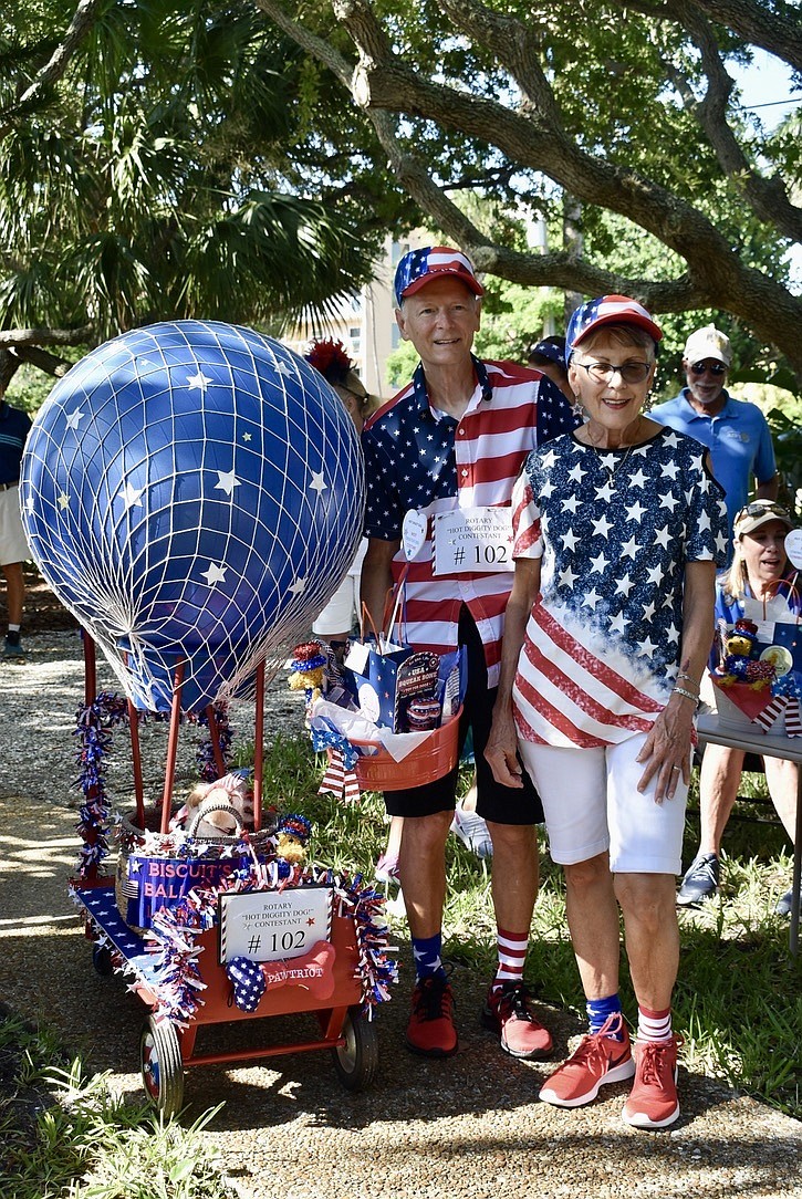 Biscuit, Tony and Nancy Roberts take home the prize for Most Creative Costume.