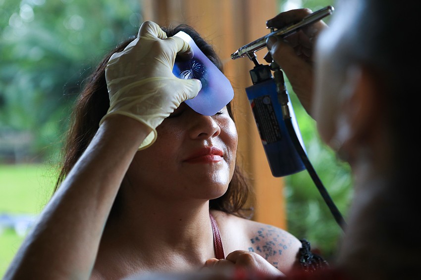 Kirsty Sledge has her face painted.