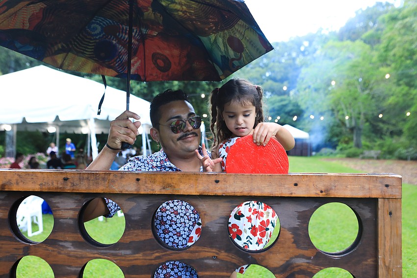 Jose and Julee Tamayool play Connect Four.