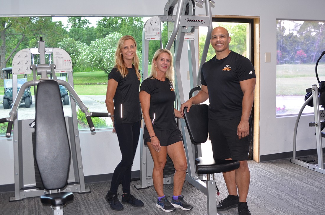West Orange Fitness owner Gina Denison, center, with Penny Dittbrenner and Brandon Strong, offer personal training at her new gym at the West Orange Country Club.