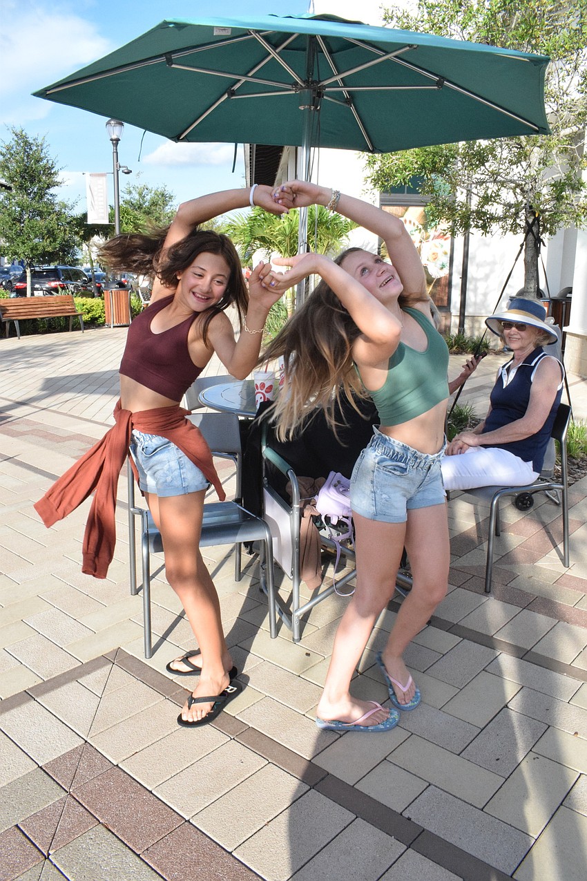Lakewood Ranch 12-year-olds Jocelyn Annicelli, and her cousin Angelina Annicelli practice their dance moves.