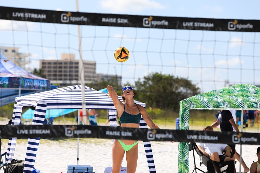 Presley Murray plays doubles early Saturday.