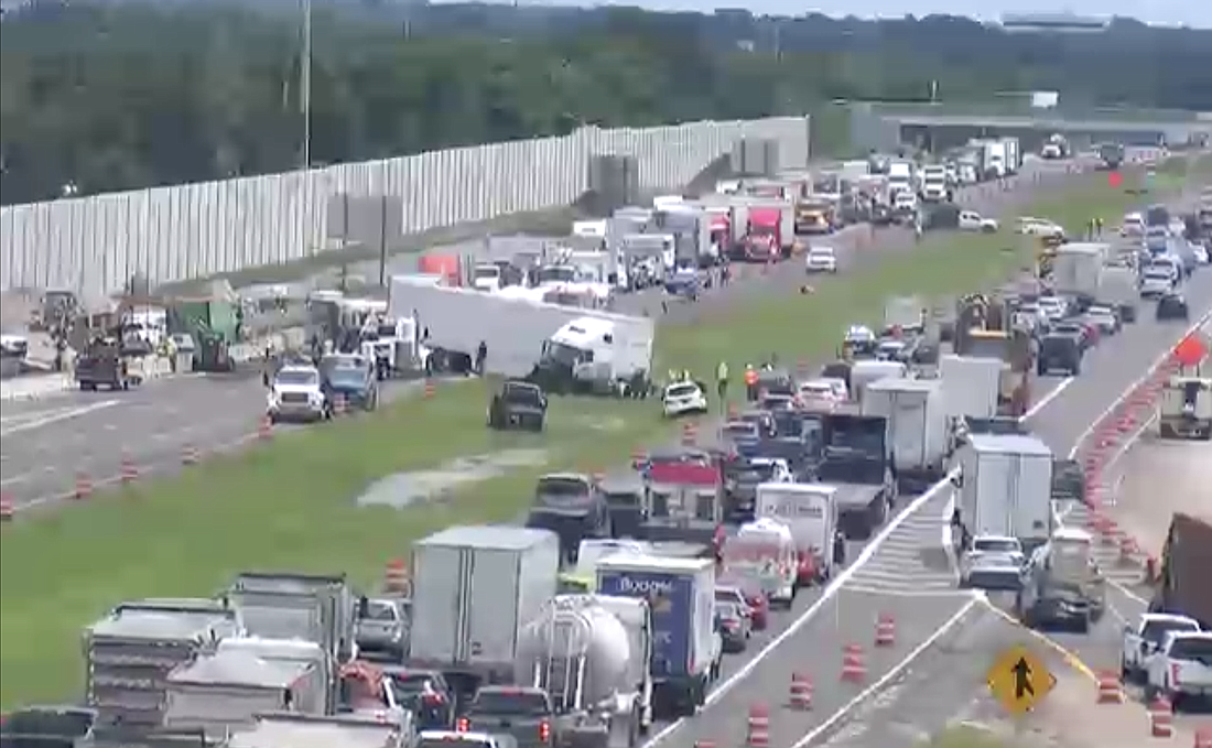 Florida Department of Transportation cameras show the extent of the crash and traffic tie-ups.