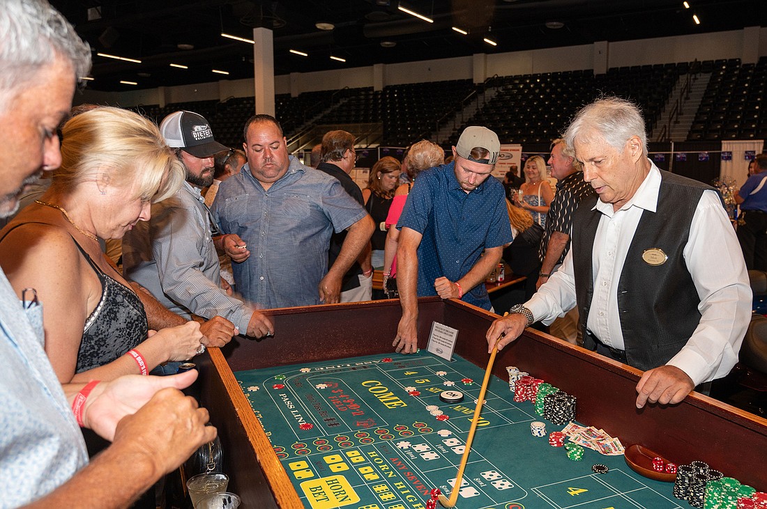 The latest Waves and Wheels party got people going at the casino tables. (Photo courtesy of Lori Sax)