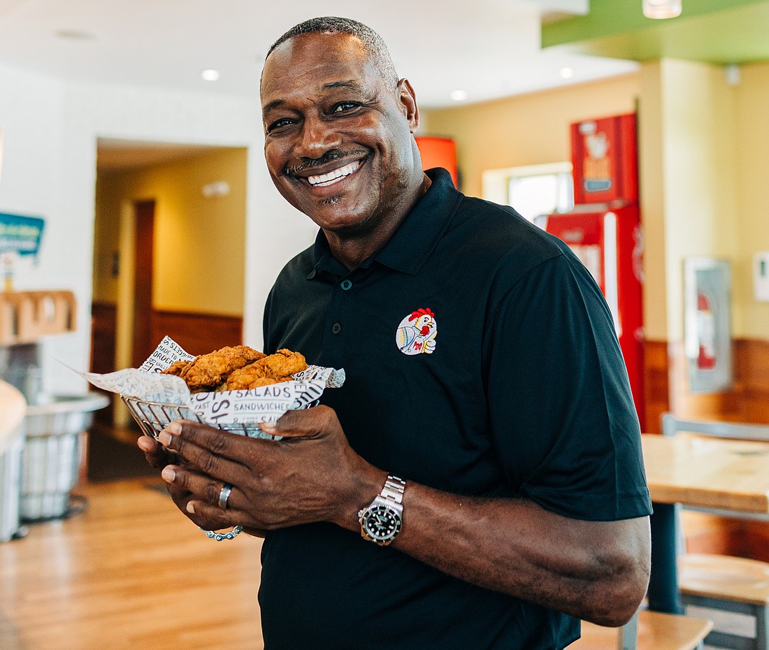 Former Bucs star Derrick Brooks attended the grand opening of PDQ&#39;s latest restaurant, in Brooksville. (Courtesy photo)