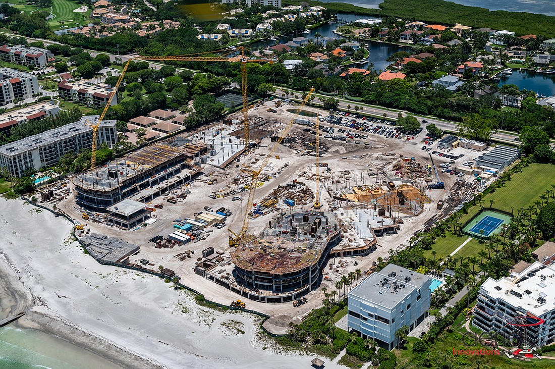 July 8, 2022: An aerial of the project shows progress on several fronts, with the hotel building on the left and the first of the condo buildings on the right. (Courtesy photo)