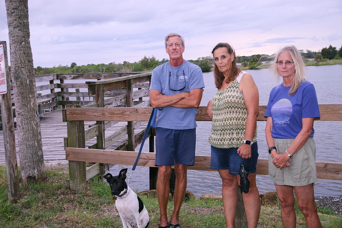 Ormond-by-the-Sea residents Mark Andrews, Karen Schaper and Karin Leith are among those who want their neighborhood's kayak launch reopened. Photo by Jarleene Almenas