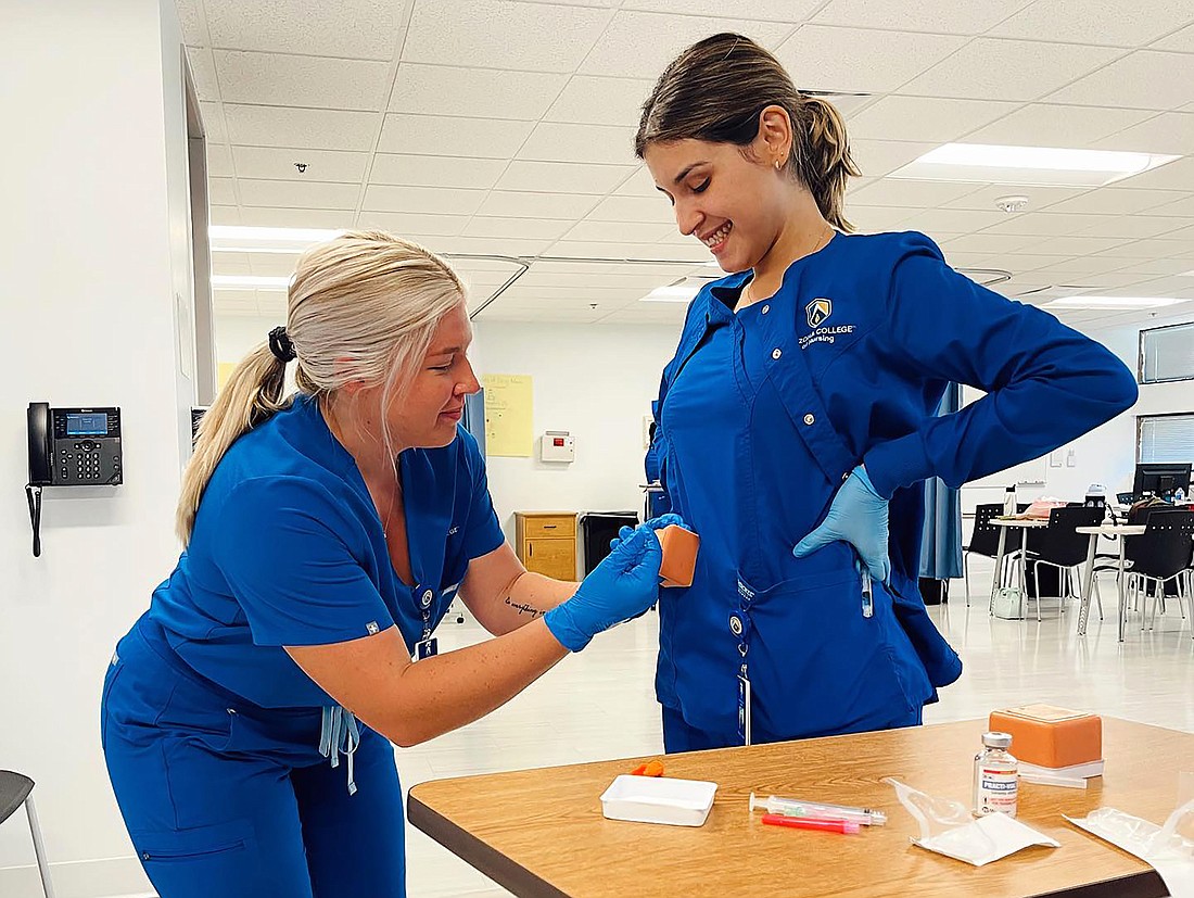 Arizona College of Nursing students practice their skills in the simulation lab, which provides hands-on learning opportunities for students. (Courtesy photo)