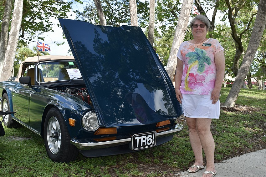 Debbie Wilson drives her TR6, saying 