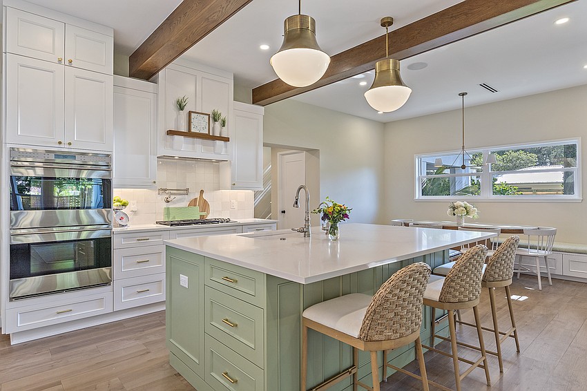 The kitchen features a central island.