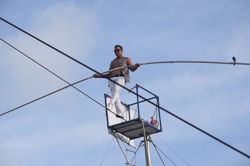 Blake Wallenda begins his walk on the highwire as the spectators below at Nathan Benderson Park hold their breath.