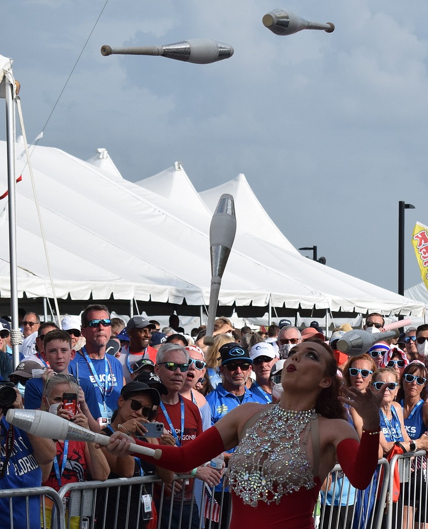 Juggler Gena Cristiani had her hands full during the opening ceremonies.