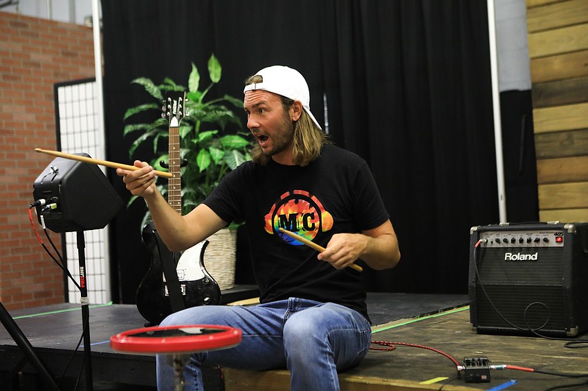 Music Compound instructor Taylor Galford gets his students going.