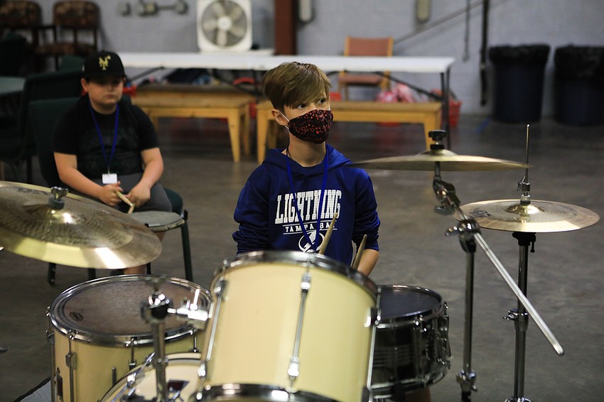 Luc Drage listens closely to the rhythm.