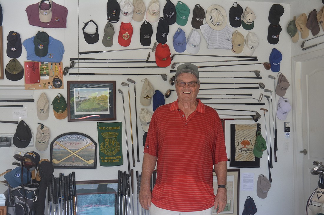 Central Park&#39;s Keith Heifner started his golf collection in 2017 as something to pass on to his son one day. He is always looking for things to add to it, searching garage sales for diamonds in the rough. (Photo by Ryan Kohn)