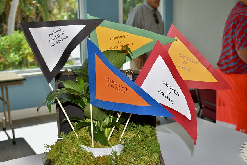 Flags fly for back-to-school scholarships.