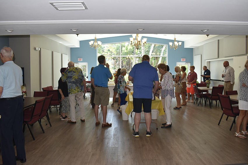 Congregation members celebrate the students who received scholarships.