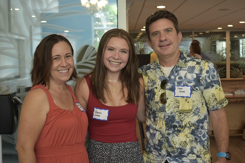 Cathy Lucas, recipient Grace Lucas and Matt Lucas