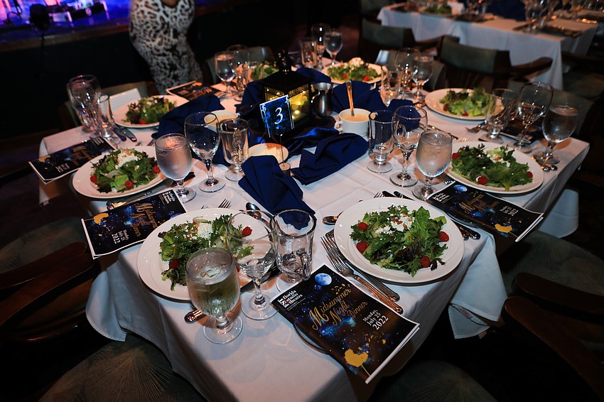 Guest sat down for dinner and music.