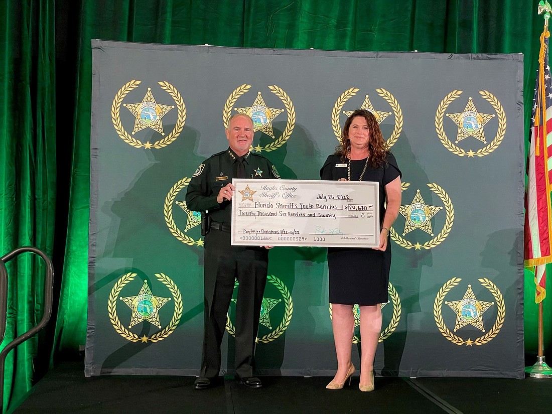 Flagler County Sheriff Rick Staly and FSYR Executive Vice President Maria Knapp. Photo courtesy of the Flagler County Sheriff's Office