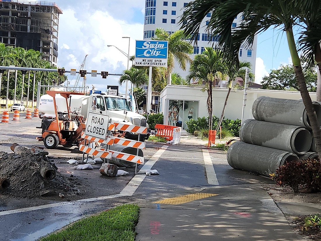 The Swim City store at Tamiami Trail and First Street has been plagued by roundabout construction for more than a year. (Photo by Andrew Warfield)
