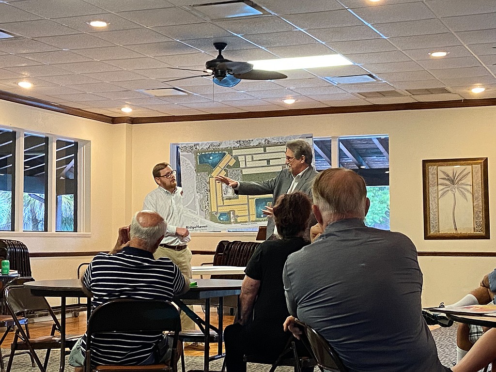 Attorney Glenn Storch speaks to the public during the neighborhood meeting for RidgeHaven on Tuesday, July 26. Photo by Jarleene Almenas