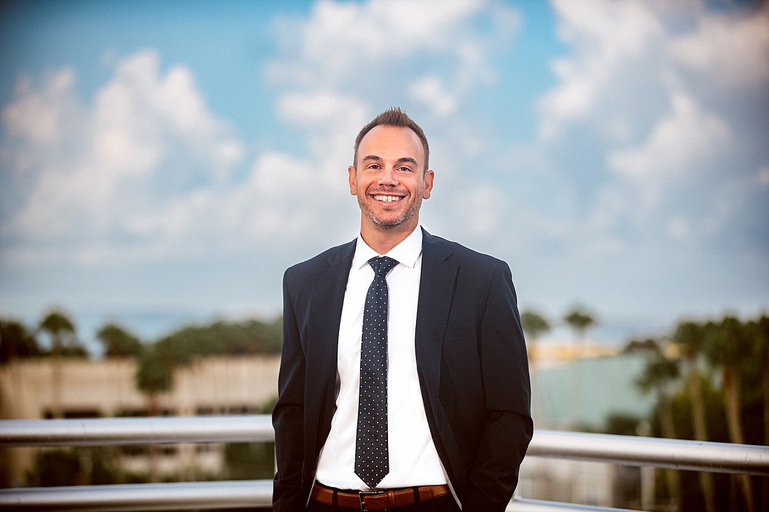 Attorney Brandon Szymula has joined Hall Booth Smith P.C. as a partner and will be based at the law firmâ€™s Tampa office. (Courtesy photo)