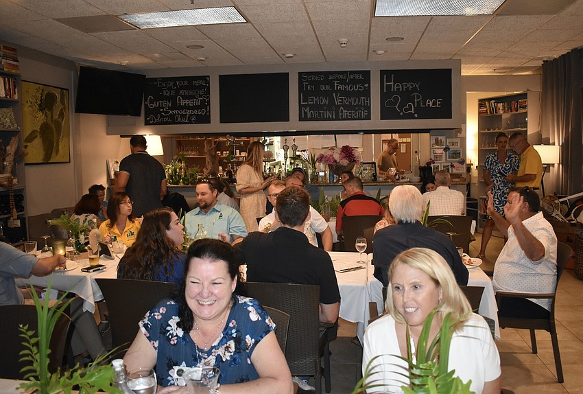 About 50 Longboat Key Chamber of Commerce members attend the latest Business After Hours event at the Cedars Tennis Resort & Club.